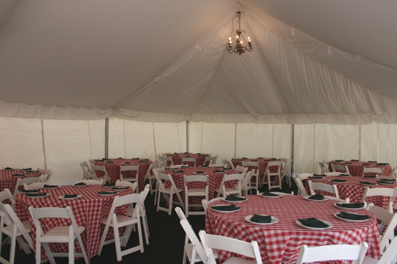 Tent decorated for a wedding rehersal dinner