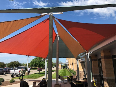 Image shade panels - eating area is shaded by innovative shade structure.