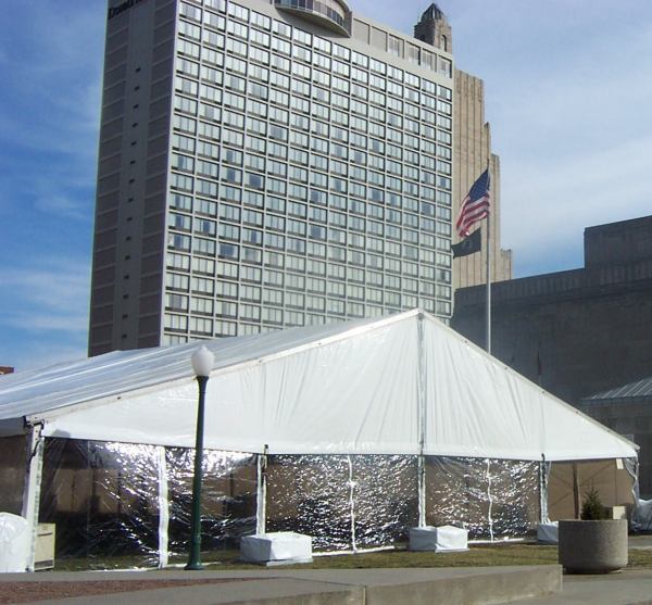 sideview of LT&A SUPER TENT® with covered weights a Kansas City tent rental