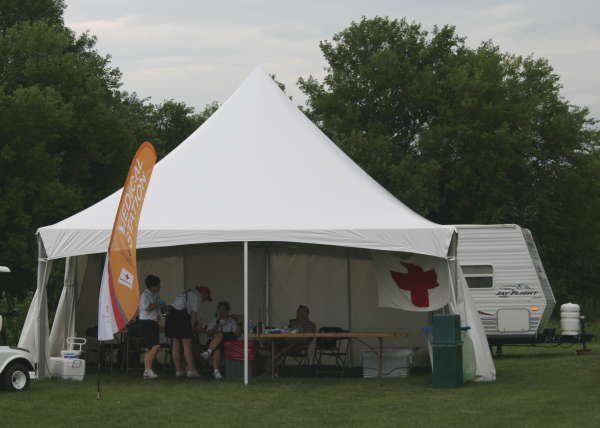 IMAGE of 20 X 20 tension top frame tent used for a first aid station