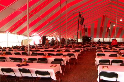 Interior View Commercial Pole Tent set with banquet tables for a church dinner