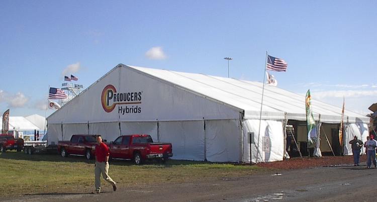 IMAGE of 80 X 60 clear span tent with customer logo on gable end