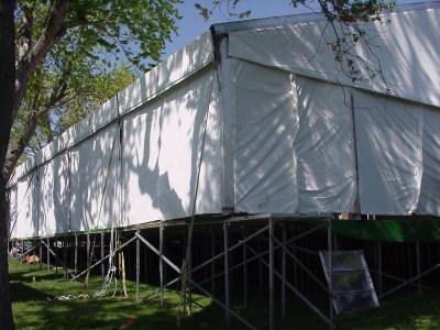Image of back corner of tent set on raised deck