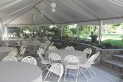 Thumbnail tent against raised bed. Tent rental located in Lincoln, NE