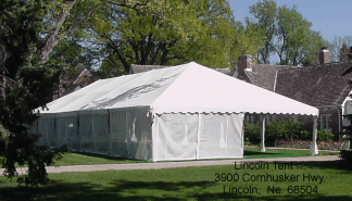 Image End view clear span frame tent with screen walls