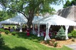 Thumbnail Omaha tent rentals set in a series around a tree